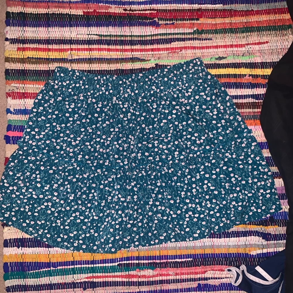 Floral skirt above knees
